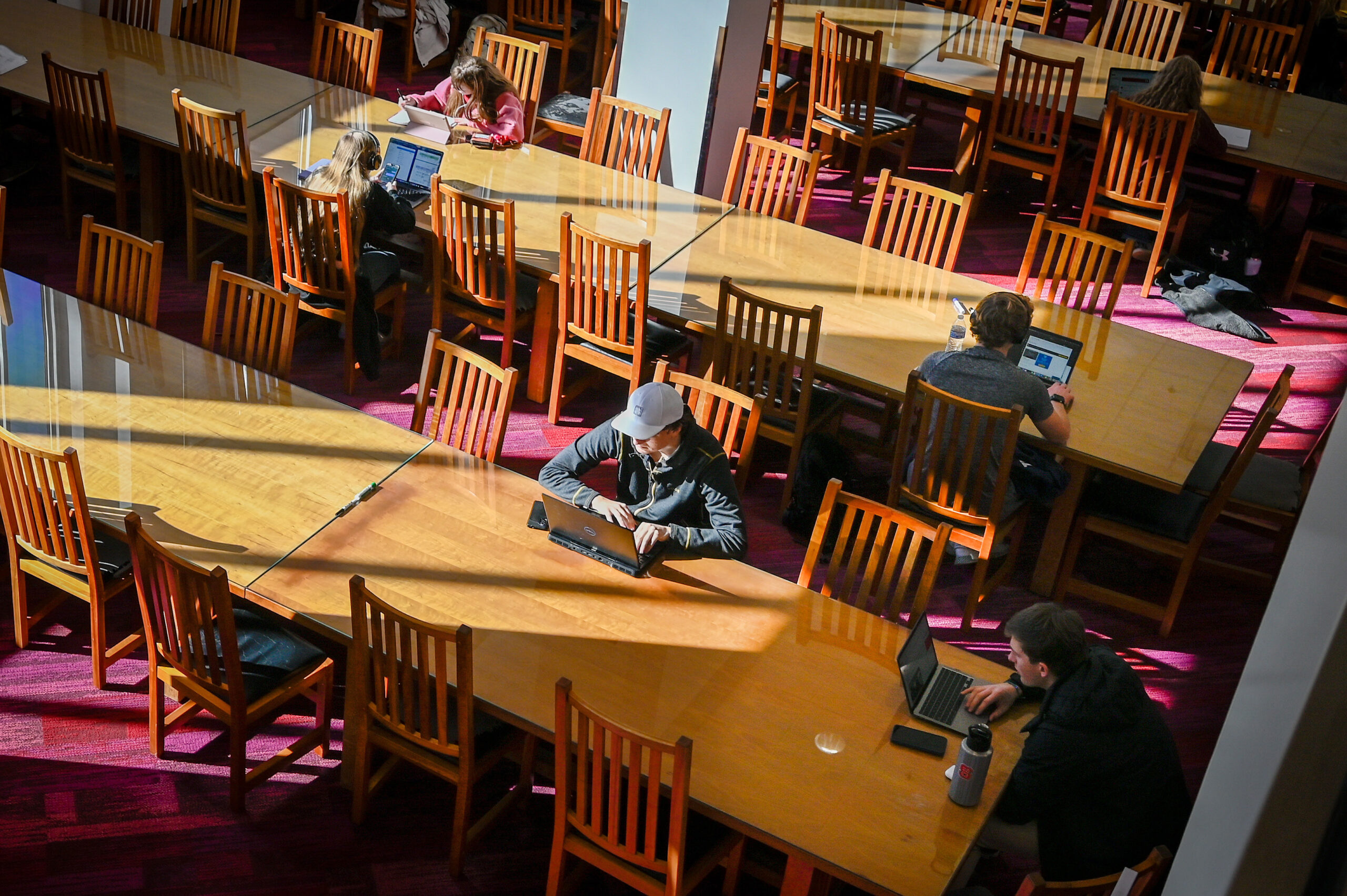 Students study in DH Hill, Jr. Library on main campus on the first day of the Spring 2023 semester. Photo by Becky Kirkland.